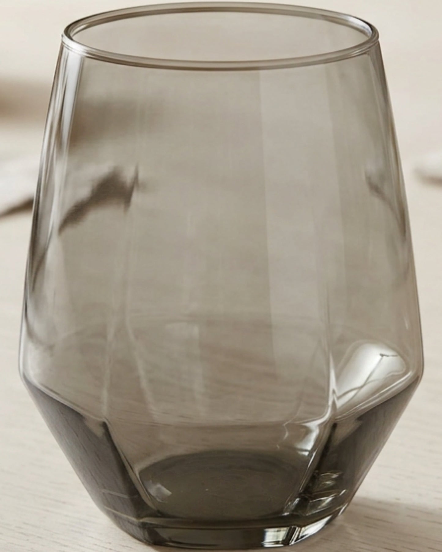 Kwdrx Six-Facet Base Stemless Wine Glass 16 oz Smoke Gray - Lifestyle view